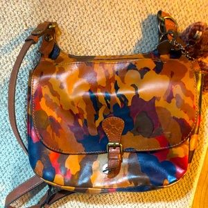 Patricia Nash Salerno with shearling Pom Poms